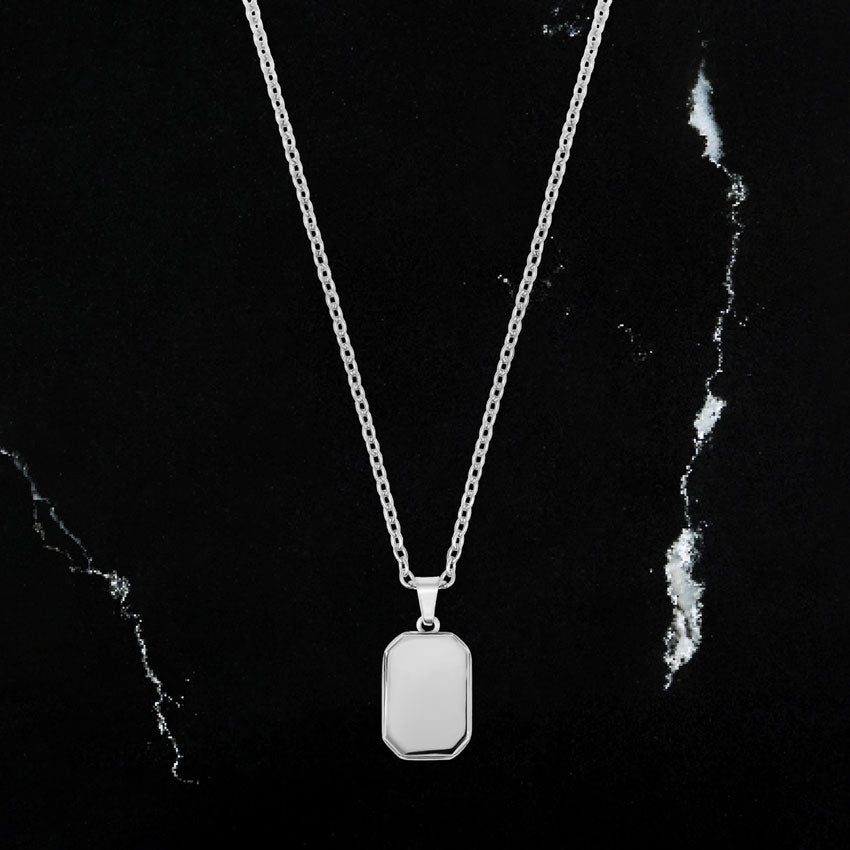 Minimal tag pendant necklace in silver. Rose gold and black.