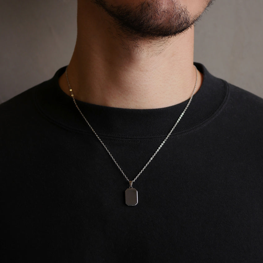 Minimal tag pendant necklace in silver. Rose gold and black.