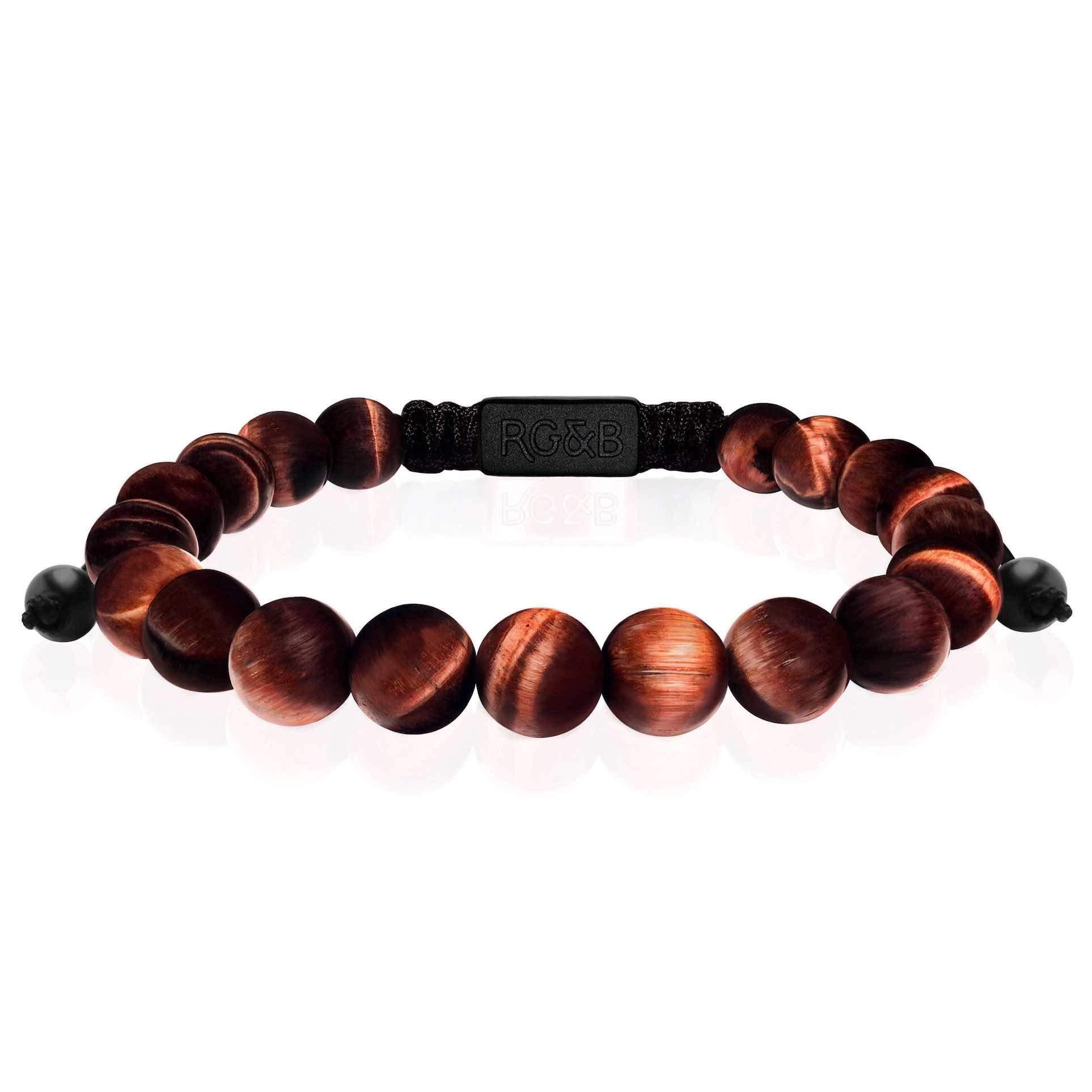Red Tiger Eye Bead Bracelet - Our Red Tiger Eye Bead Bracelet Features Natural Stones, Waxed Cord and Brushed Black Steel Hardware. A Beautiful Addition to any Collection.