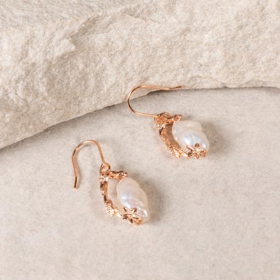 Women's Pearl Earrings - Fine wire hook earring featuring a uniquely molded Flower combined with a precious rough pearl to form a timelessly beautiful pendant. Fine brass, plated with gold or rose gold.