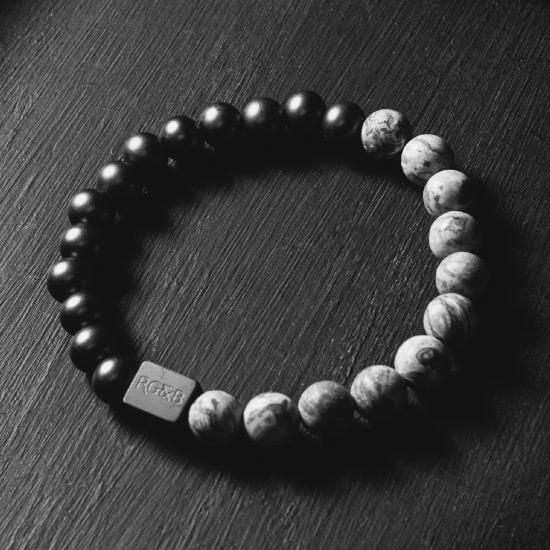 Grey Jasper Stone Bead Bracelet - Our Grey Jasper Stone Bead Bracelet Features 8mm Natural Stones, Premium Elastic Cord and Brushed Black Hardware. A Beautiful Addition to any Collection.