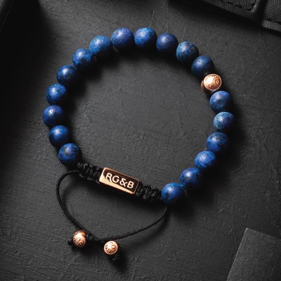 Premium Lapis Lazuli Bracelet - Our Premium Lapis Lazuli Bead Bracelet Features Natural Stones, Waxed Cord and Polished Rose Gold Steel Hardware. A Beautiful Addition to any Collection.