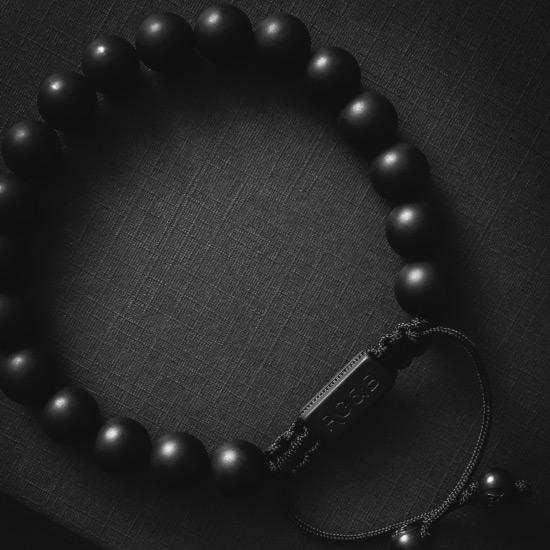 Matte Black Bracelet - Our Matte Black Bead Bracelet Features Natural Stones, Waxed Cord and Brushed Black Steel Hardware. A Beautiful Addition to any Collection.