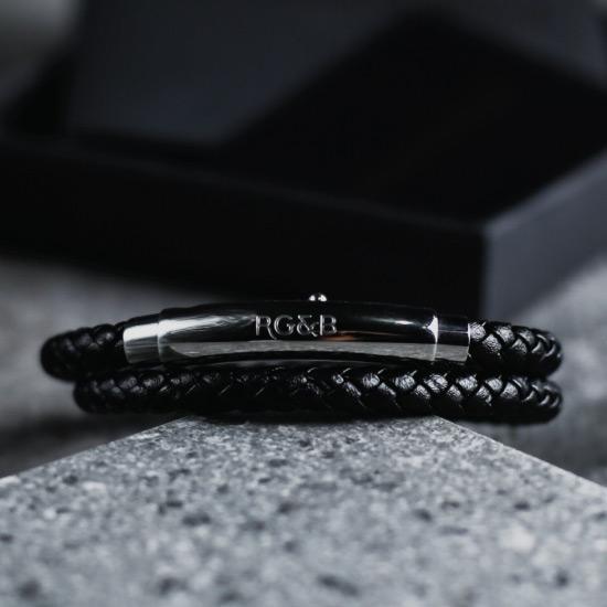 Double Leather Bracelet in Silver & Black - Our Men's Double Leather Bracelet with Black Leather and a Polished Silver Adjustable Clasp Engraved with our Signature RG&B Logo.