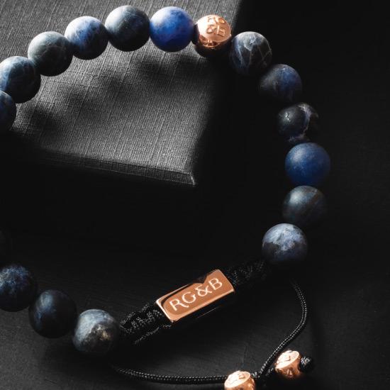 Premium Sodalite Bracelet - Our Premium Sodalite Bead Bracelet Features Natural Stones, Waxed Cord and Polished Rose Gold Steel Hardware. A Beautiful Addition to any Collection.