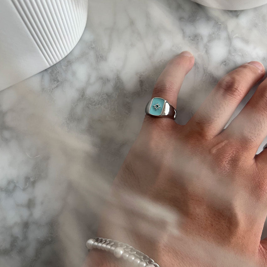 Our Vintage Star Signet Ring in Aqua has been crafted to be worn on a day-to-day basis or even as a fun statement piece while you're out and about.