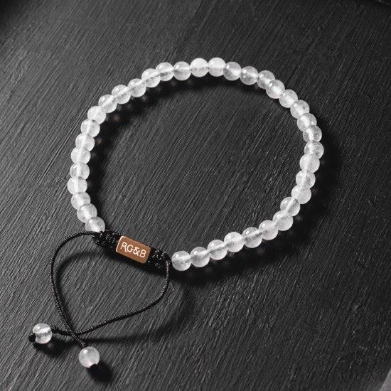 Minimal White Jade Bead Bracelet - Our Minimal White Jade Bead Bracelet Features Natural Stones, Waxed Cord and Brushed Rose Gold Steel Hardware. A Beautiful Addition to any Collection.